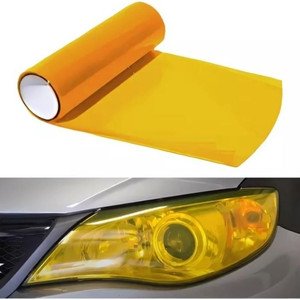 PAPEL AUTOADHERIBLE PARA FARO DE 0.30X10 M AMARILLO. (ROLLO)